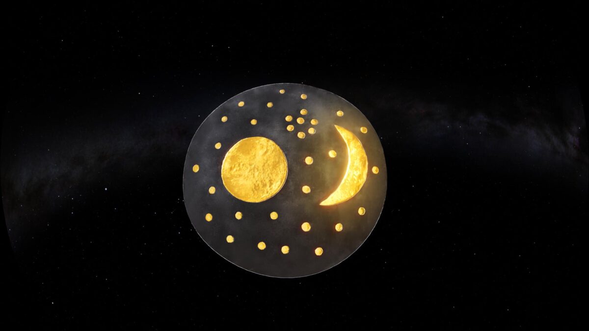 The Nebra Sky Disk in it's first form, without the golden horizon attachments at the sides which where added later. The  golden moon is glowing.